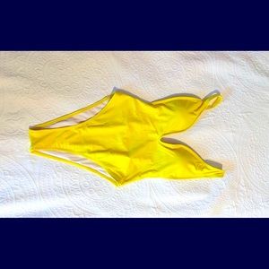 Yellow Size Small  New without tags. Looks like Bikini in back.